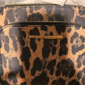 Steve Madden shoulder bag with front compartment .
